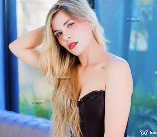 Acompanhante Laura Alves