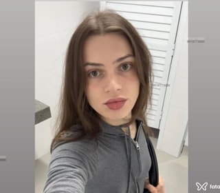 Acompanhante Regina