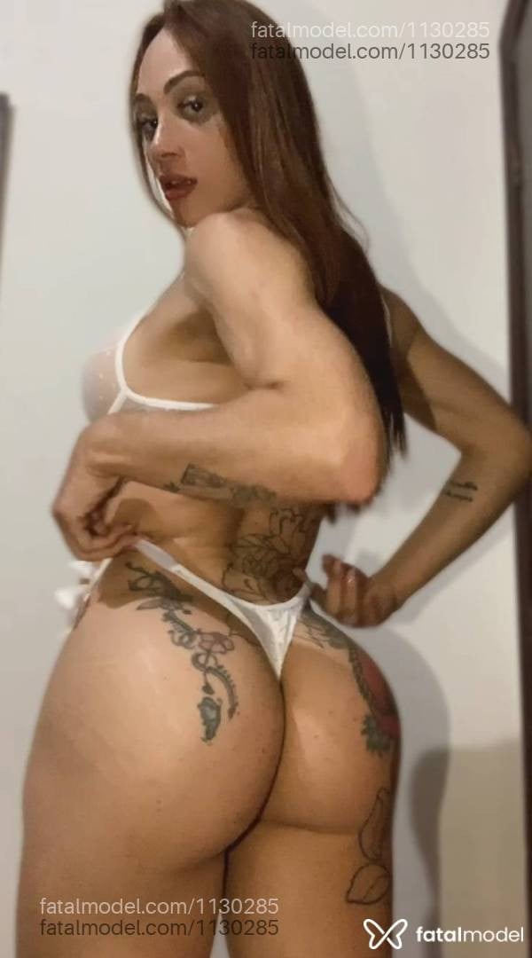 Acompanhante mulher trans ruiva (o) de olhos castanhos - Fernanda Müller