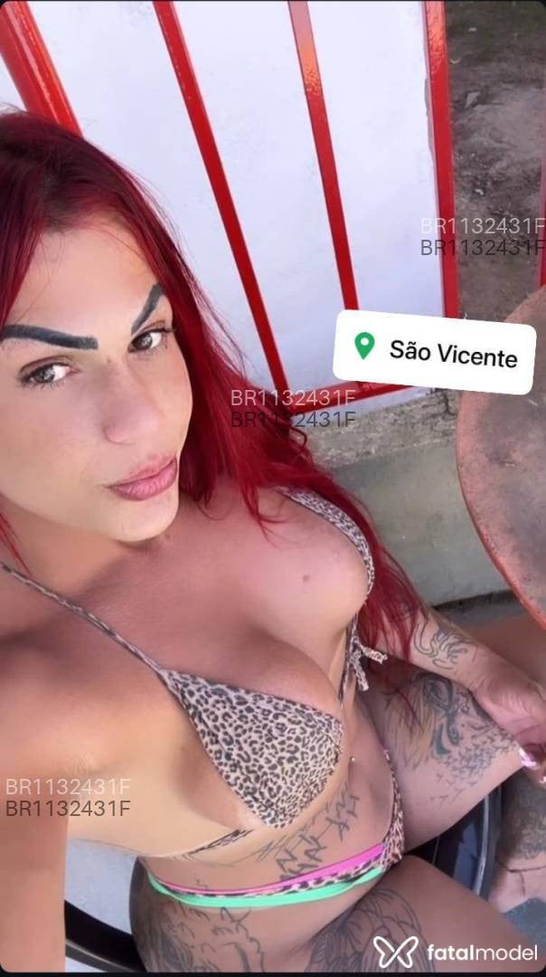 Acompanhante travesti ruiva (o) de olhos cinza em Santos - Ravena