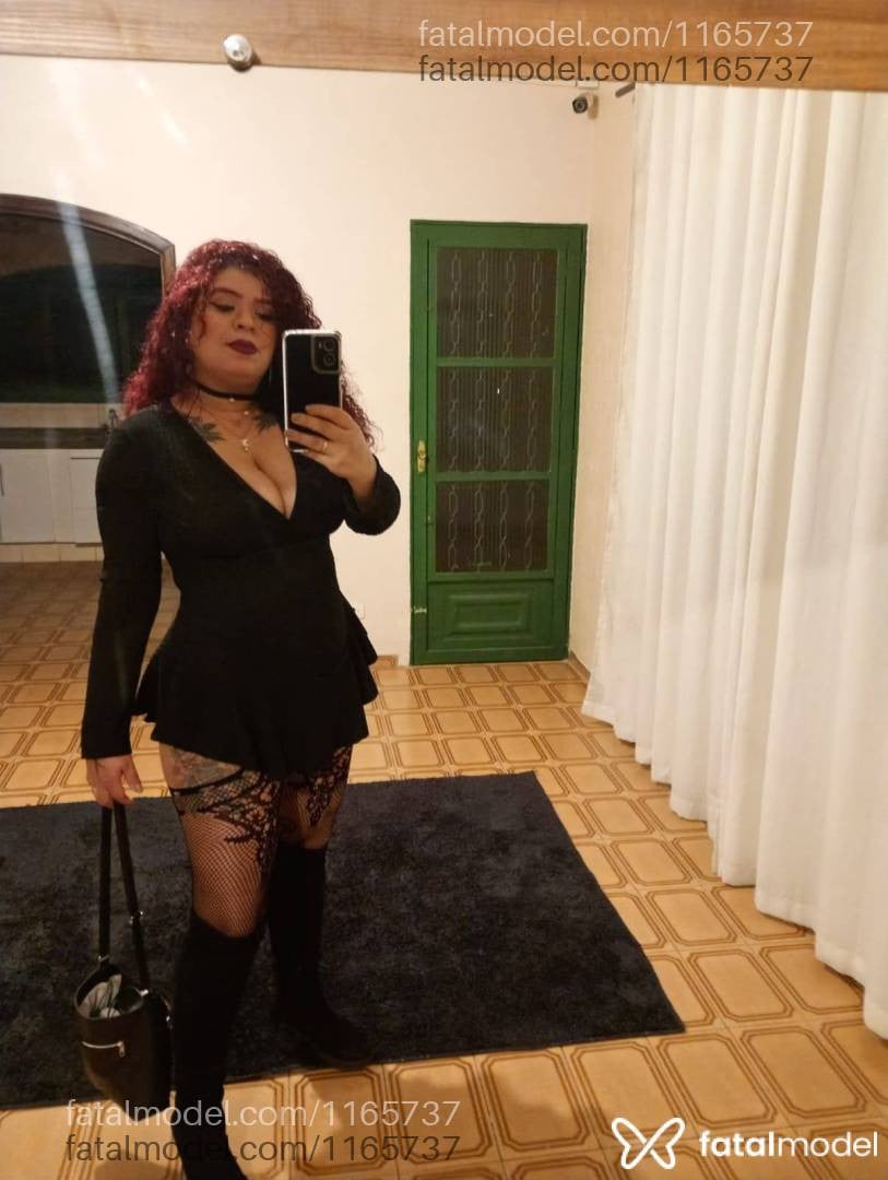 Acompanhante mulher ruiva (o) de olhos verdes - Paola Bracho