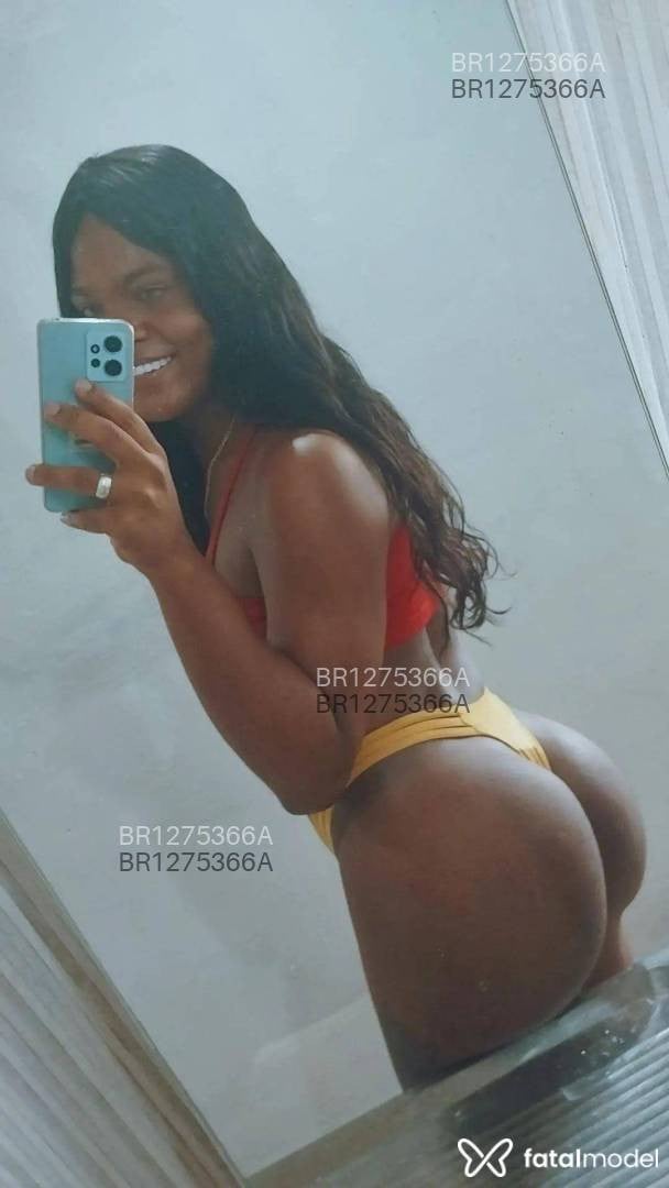 Acompanhante mulher trans com cabelo castanho de olhos mel em Belo Horizonte - Dalila Santos