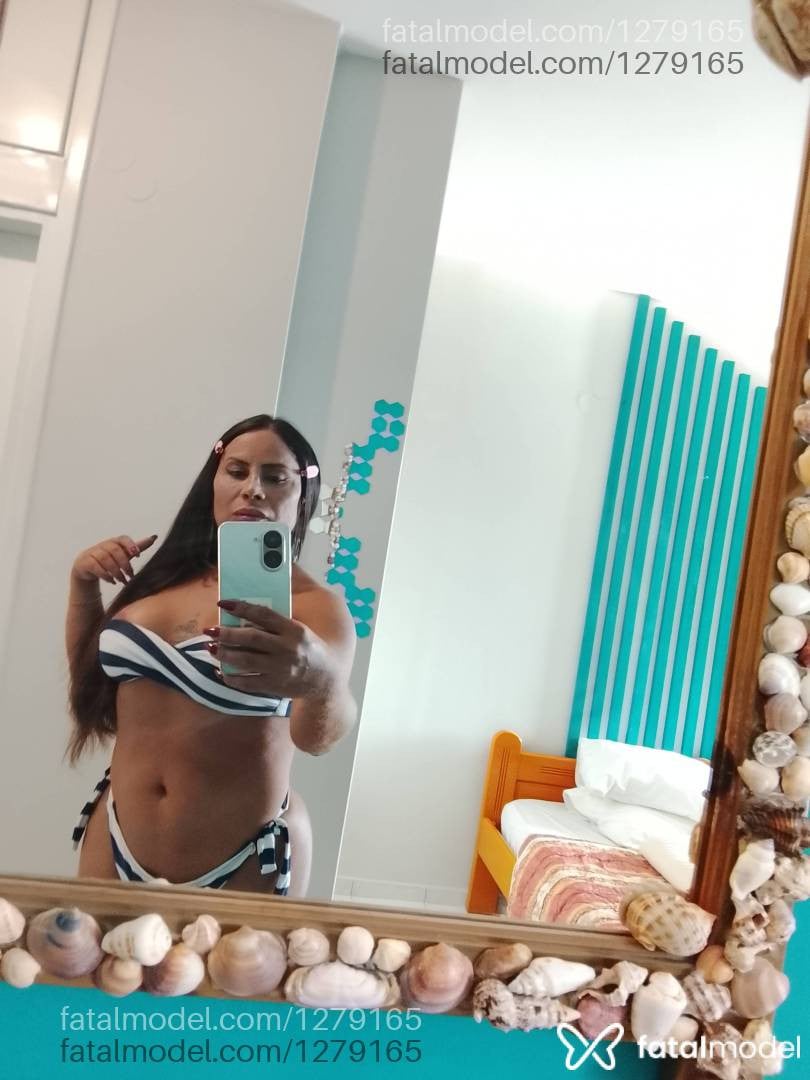 Acompanhante mulher trans com cabelo castanho de olhos castanhos em Castanhal - Vitória Santos
