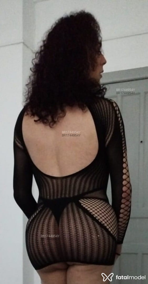 Acompanhante mulher trans com cabelo castanho de olhos castanhos - Mila Minard