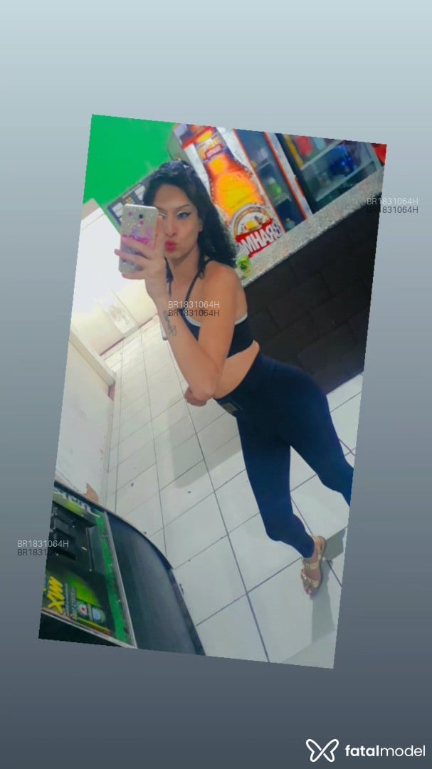 Acompanhante mulher trans com cabelo castanho de olhos castanhos em Campinas - Evellyn Lender