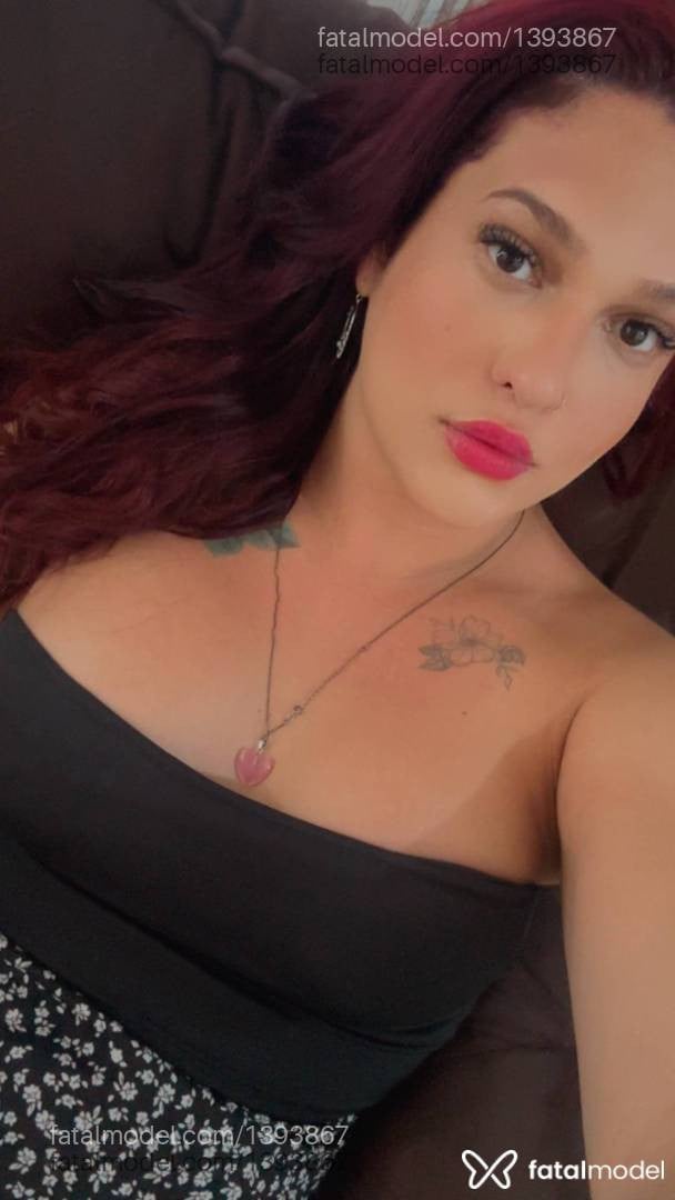Acompanhante mulher trans com cabelo castanho de olhos castanhos - Luana Rodrigues