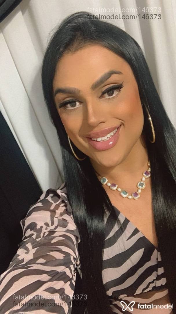 Acompanhante mulher trans morena (o) de olhos castanhos - Raphaela