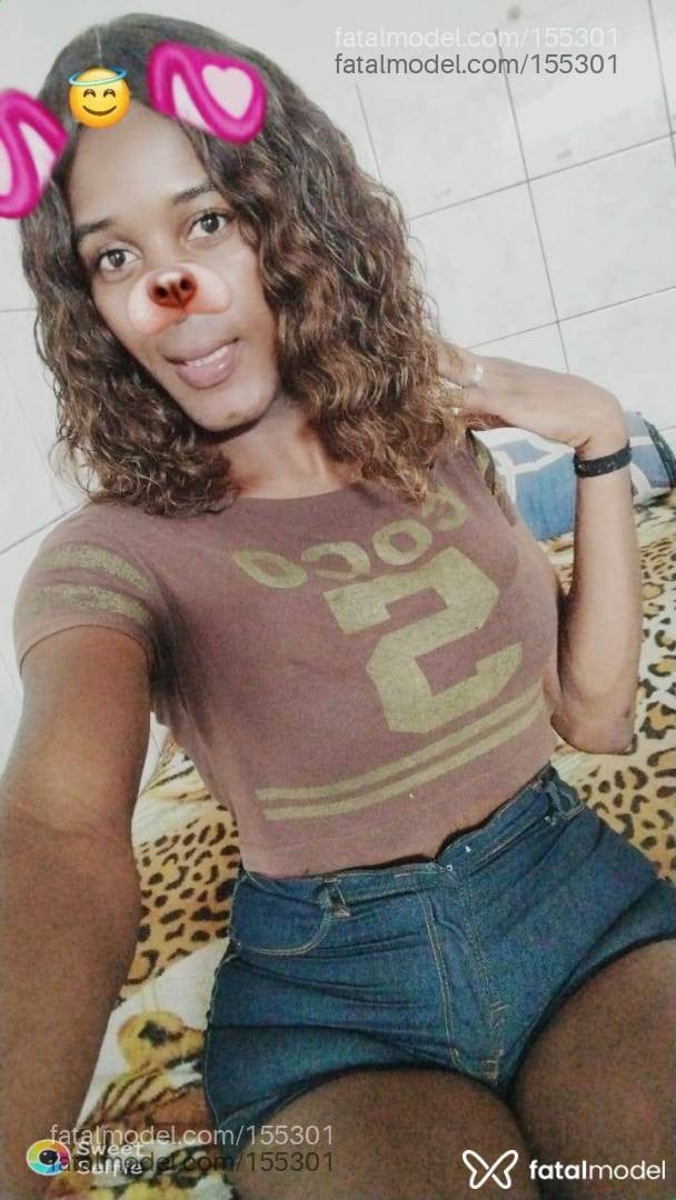 Acompanhante mulher trans com cabelo castanho de olhos castanhos - Drumont