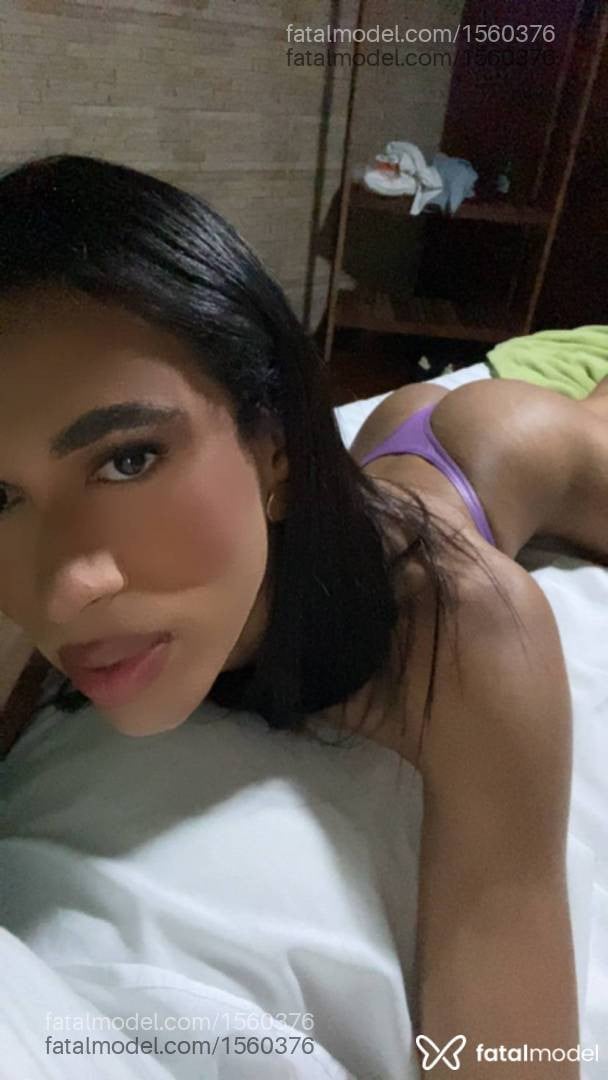 Acompanhante mulher trans com cabelo castanho de olhos castanhos - Vanessa