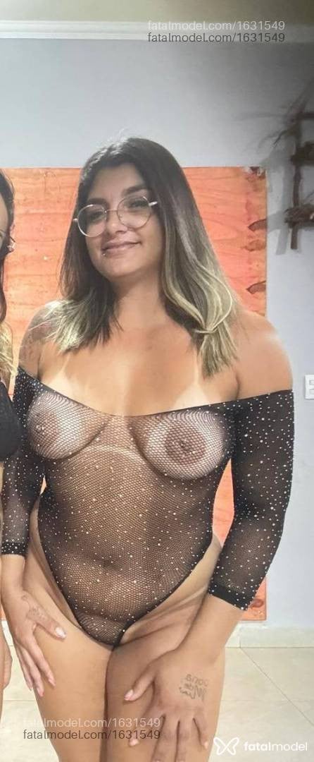 Acompanhante mulher com cabelo colorido de olhos verdes - Bella