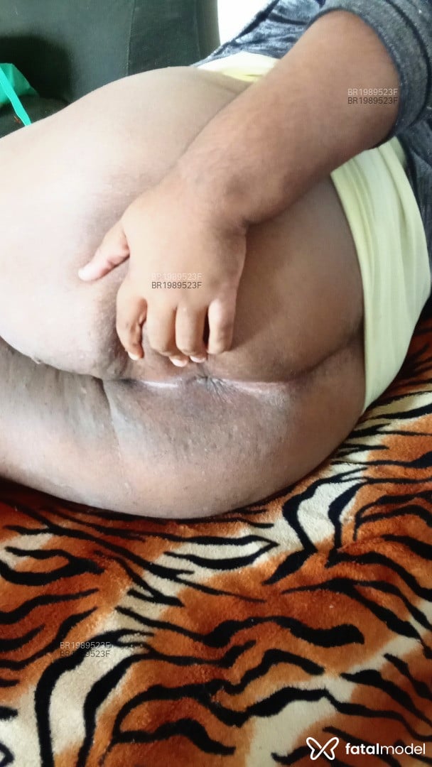Acompanhante mulher trans com cabelo castanho de olhos pretos em Armação dos Búzios - Elis Sanmes