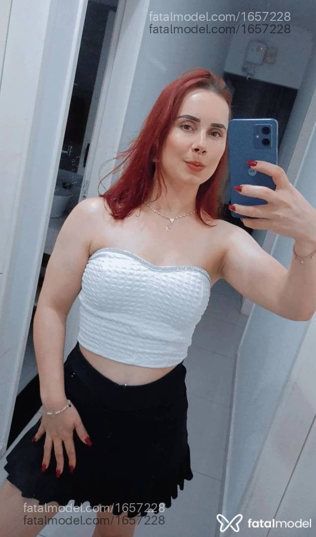Acompanhante mulher ruiva (o) de olhos castanhos - Luísa Moretti