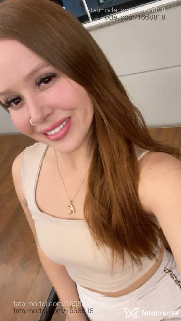 Acompanhante mulher ruiva (o) de olhos mel - Sofia Lopes