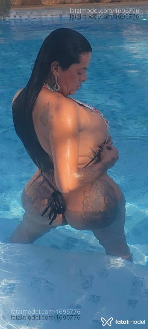 Acompanhante mulher trans morena (o) de olhos castanhos - Débora Monteiro
