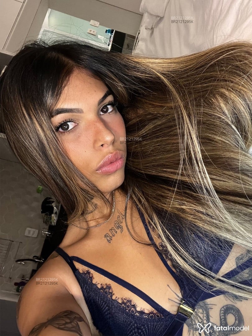 Acompanhante mulher trans com cabelo castanho de olhos castanhos em São Paulo - Luna