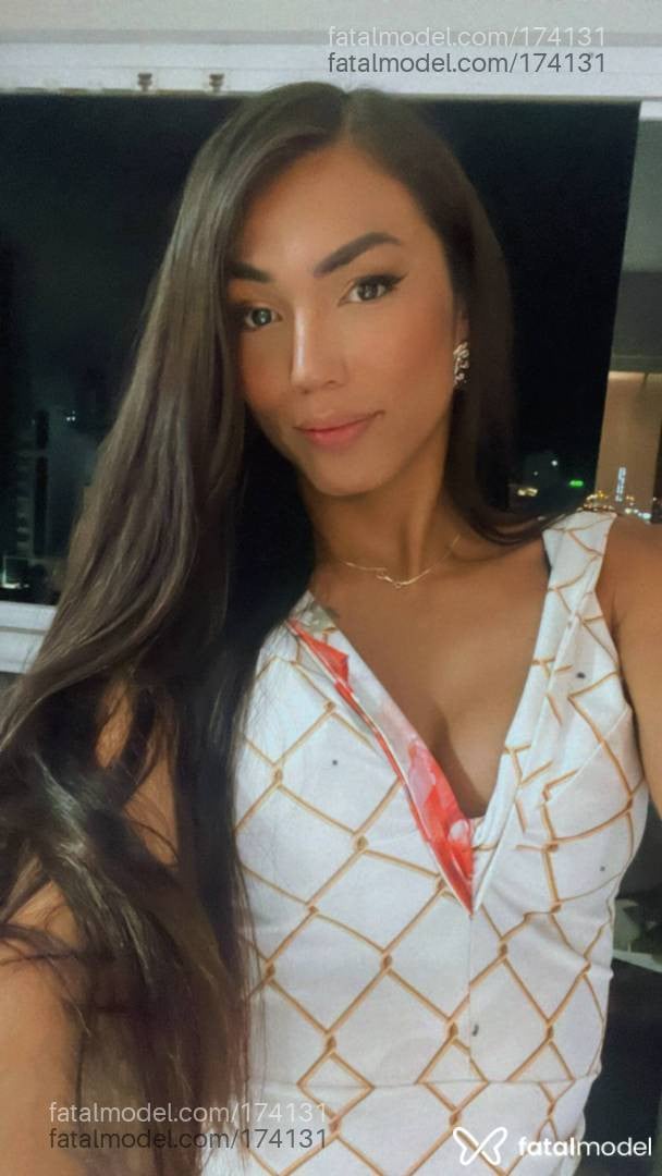 Acompanhante mulher trans com cabelo castanho de olhos pretos em Florianópolis - Ju cunhã