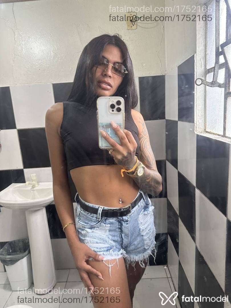 Acompanhante mulher trans morena (o) de olhos mel em São José - Elyza