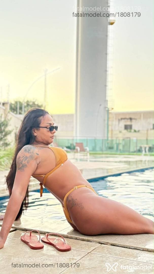 Acompanhante mulher trans morena (o) de olhos castanhos - Rayka Silva