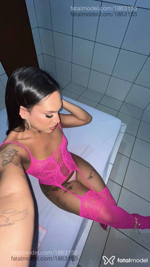 Acompanhante mulher trans com cabelo castanho de olhos castanhos - Bella