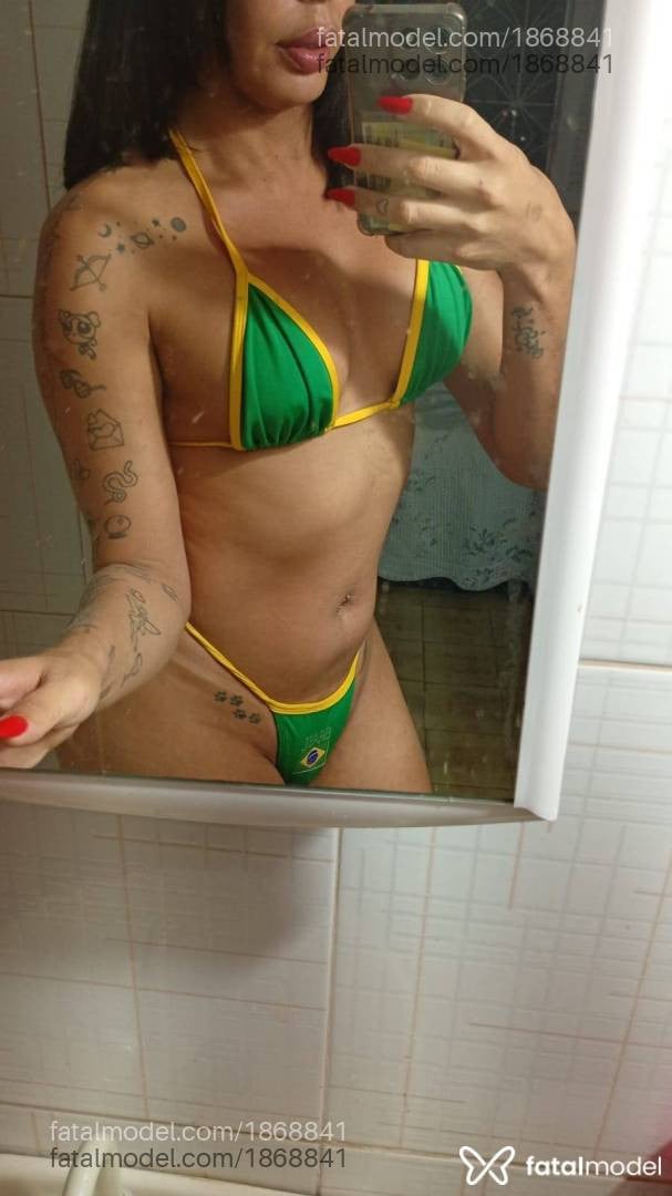 Acompanhante mulher trans morena (o) de olhos castanhos - Luana Lisboa
