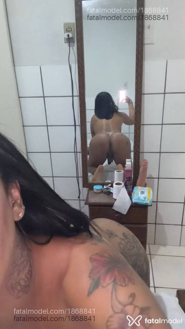 Acompanhante mulher trans morena (o) de olhos castanhos - Luana Lisboa