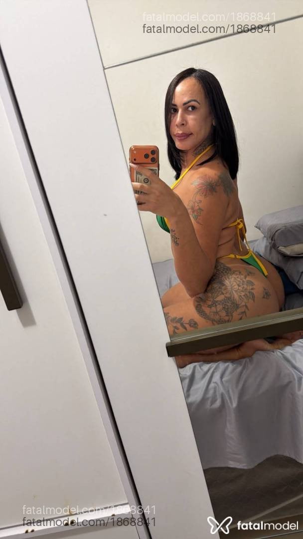 Acompanhante mulher trans morena (o) de olhos castanhos - Luana Lisboa