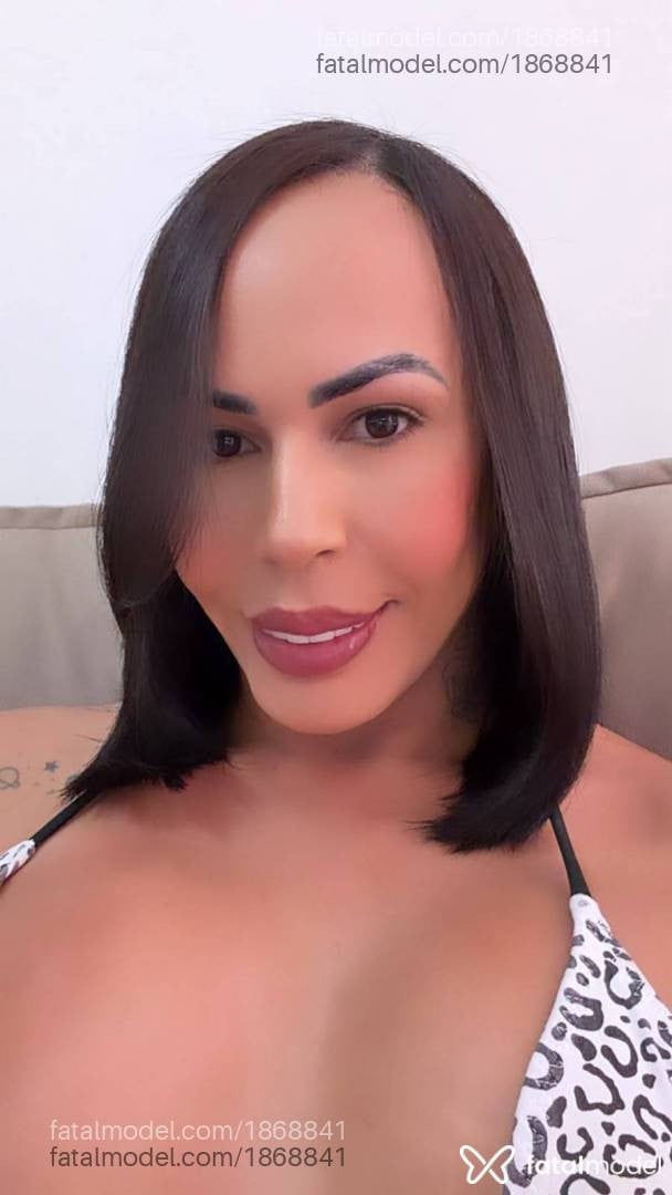 Acompanhante mulher trans morena (o) de olhos castanhos - Luana Lisboa