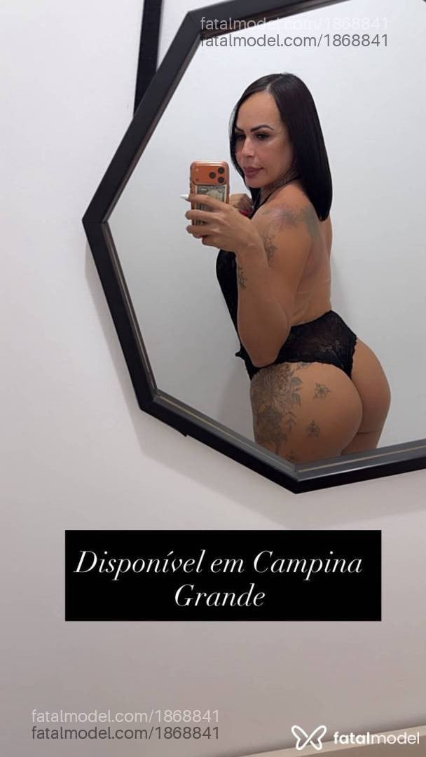 Acompanhante mulher trans morena (o) de olhos castanhos - Luana Lisboa