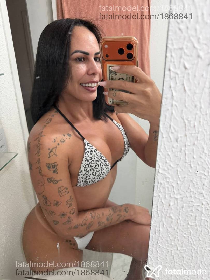 Acompanhante mulher trans morena (o) de olhos castanhos - Luana Lisboa