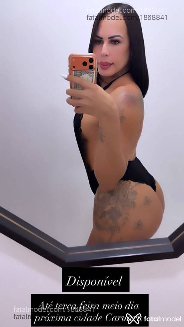 Acompanhante mulher trans morena (o) de olhos castanhos - Luana Lisboa
