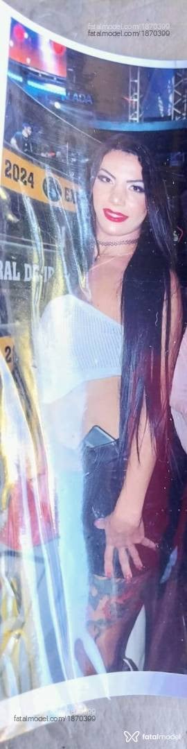 Acompanhante mulher trans com cabelo castanho de olhos verdes - Andressa Basto