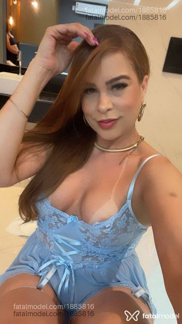 Acompanhante mulher ruiva (o) de olhos cinza - Nina Santos