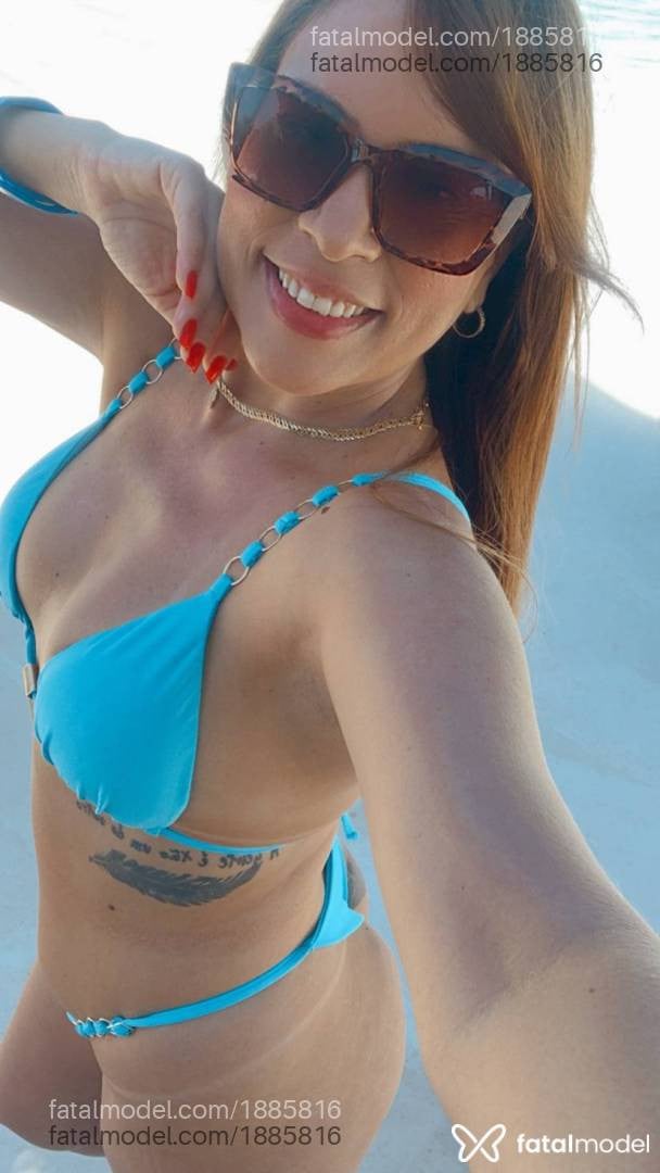 Acompanhante mulher ruiva (o) de olhos cinza - Nina Santos