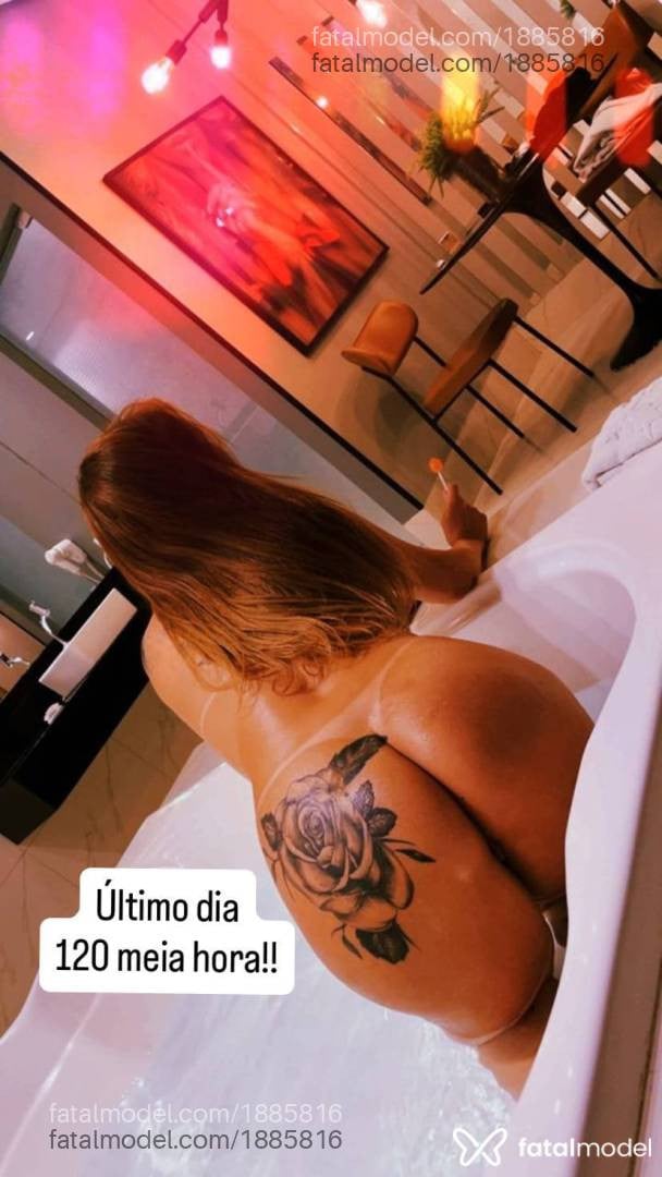 Acompanhante mulher ruiva (o) de olhos cinza - Nina Santos