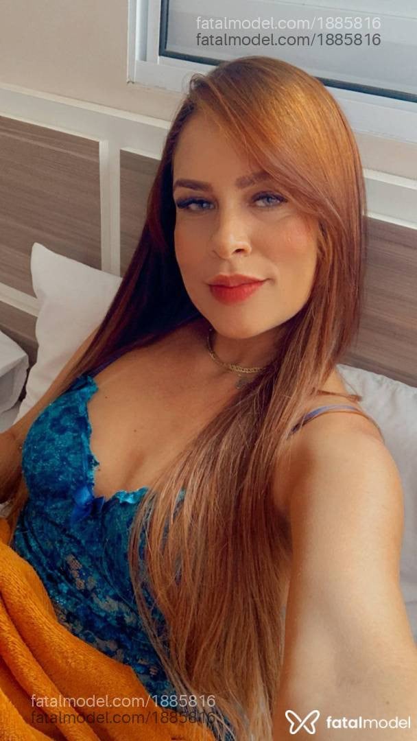 Acompanhante mulher ruiva (o) de olhos cinza - Nina Santos
