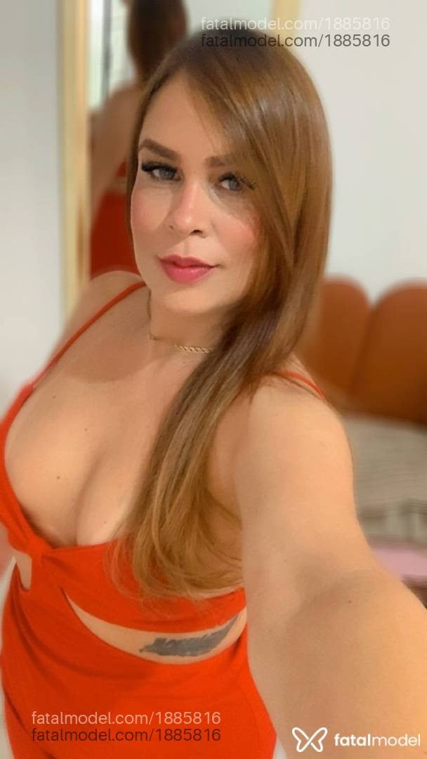 Acompanhante mulher ruiva (o) de olhos cinza - Nina Santos