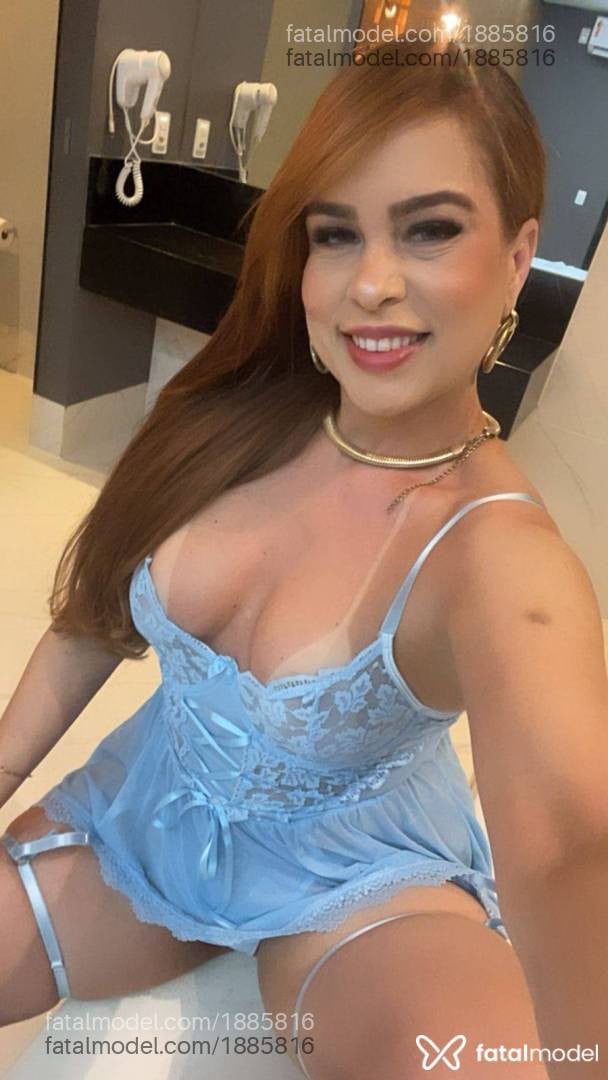 Acompanhante mulher ruiva (o) de olhos cinza - Nina Santos