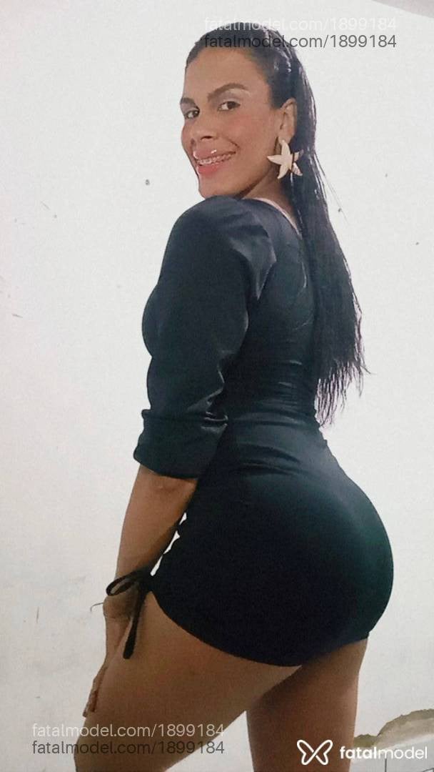 Acompanhante mulher trans com cabelo castanho de olhos mel - Rayka