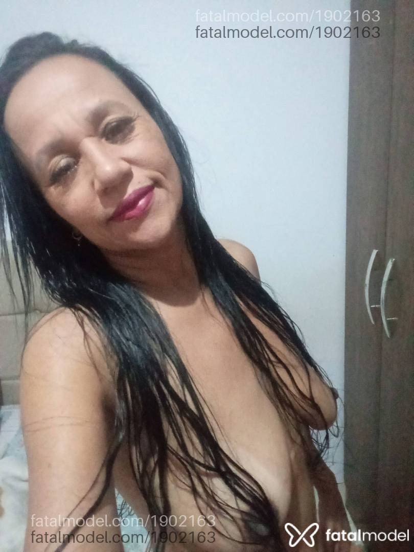 Acompanhante mulher com cabelo castanho de olhos pretos - Sandra Sol