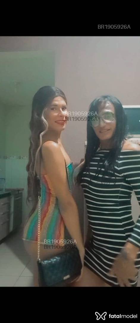 Acompanhante mulher trans com cabelo castanho de olhos pretos em Brasília - Larissa