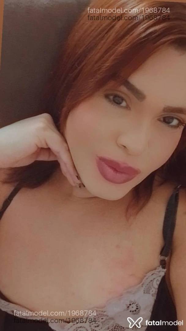 Acompanhante mulher trans ruiva (o) de olhos castanhos - Kelly