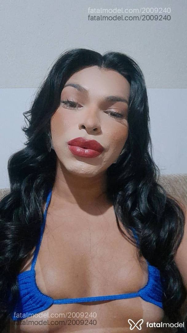 Acompanhante mulher trans morena (o) de olhos castanhos - Joana