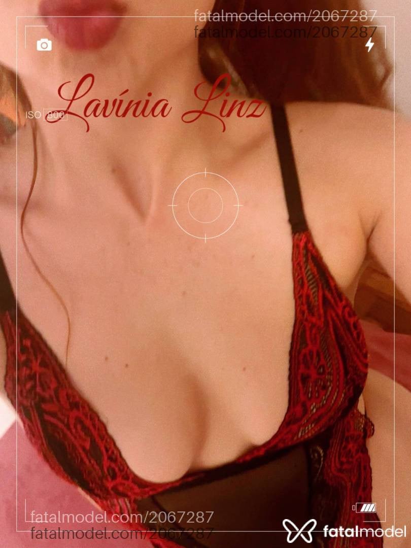 Acompanhante mulher ruiva (o) de olhos castanhos - Lavínia Maria Linz