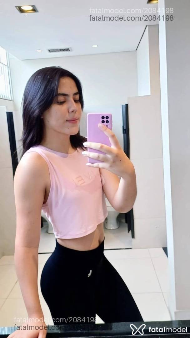 Acompanhante mulher trans com cabelo castanho de olhos pretos em São Paulo - Larissa Morais