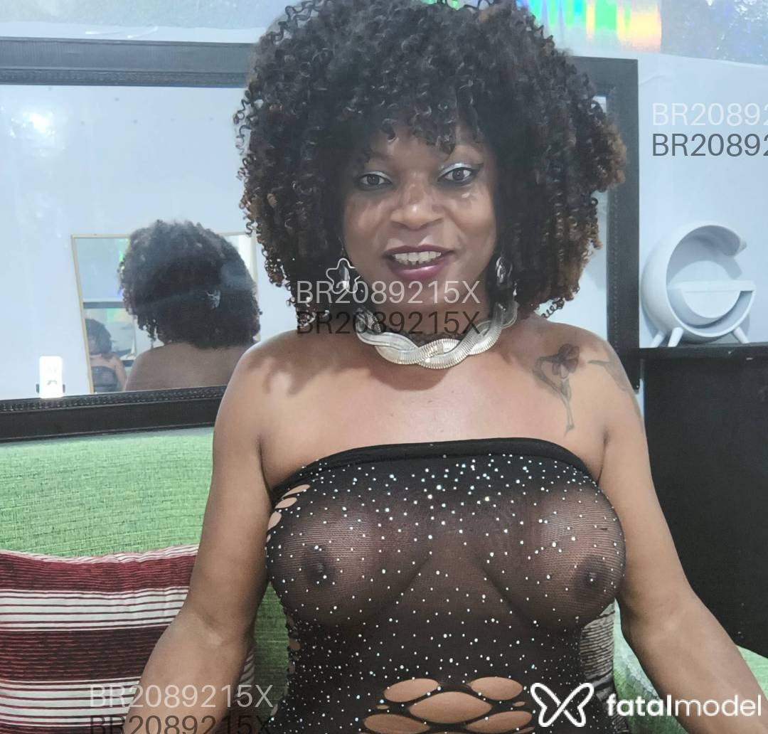 Acompanhante mulher trans com cabelo castanho de olhos pretos em São Paulo - Marcia Souza
