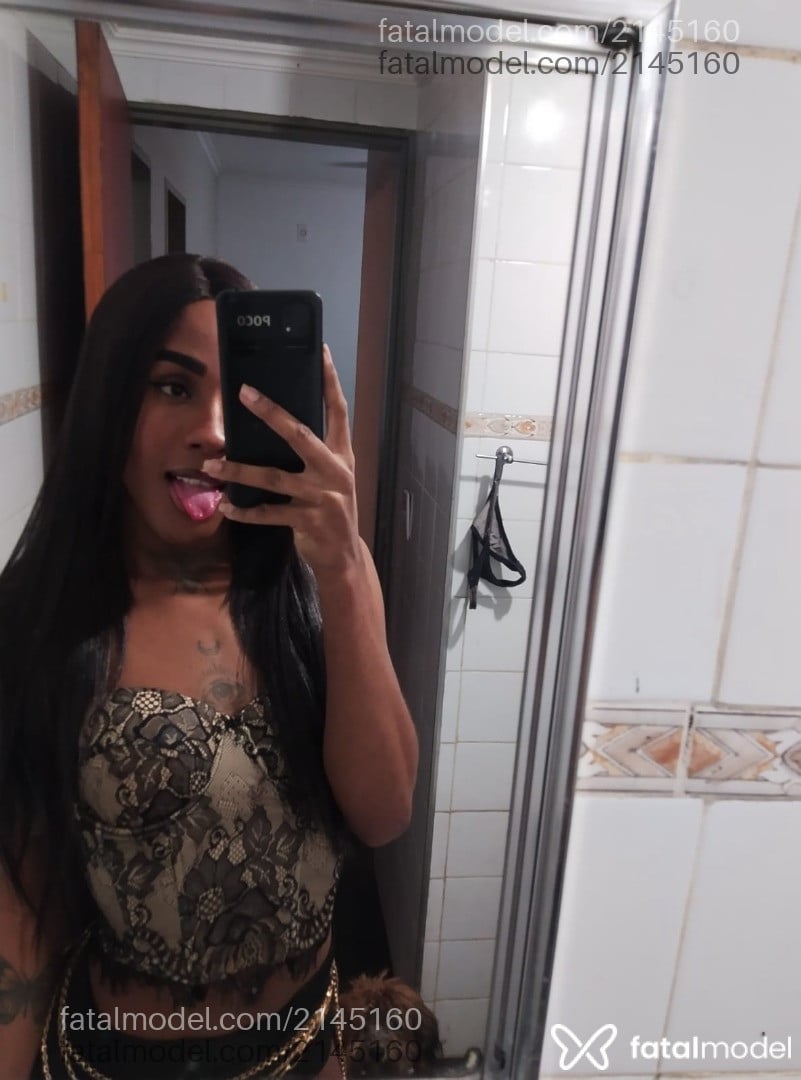 Acompanhante mulher trans com cabelo castanho de olhos pretos em Ribeirão Preto - Emanuella