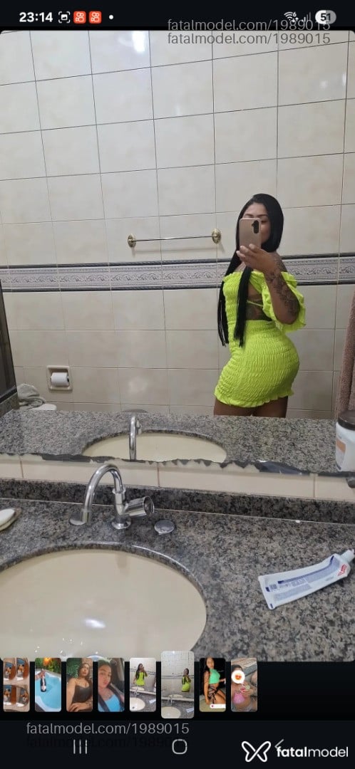 Acompanhante mulher com cabelo castanho de olhos verdes em Brasília - Bia Suggar