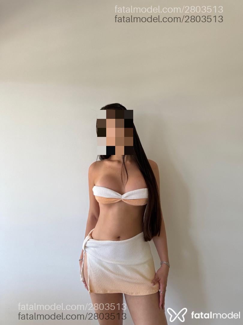 Acompanhante mulher trans com cabelo castanho de olhos verdes em Fortaleza - Larissa Costa