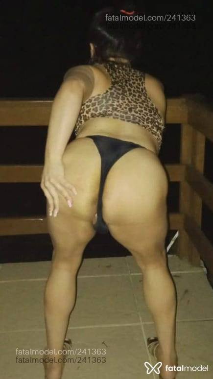 Acompanhante mulher trans morena (o) de olhos pretos - Suh Oliveira