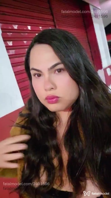 Acompanhante mulher trans com cabelo castanho de olhos castanhos - Natálie Alencar
